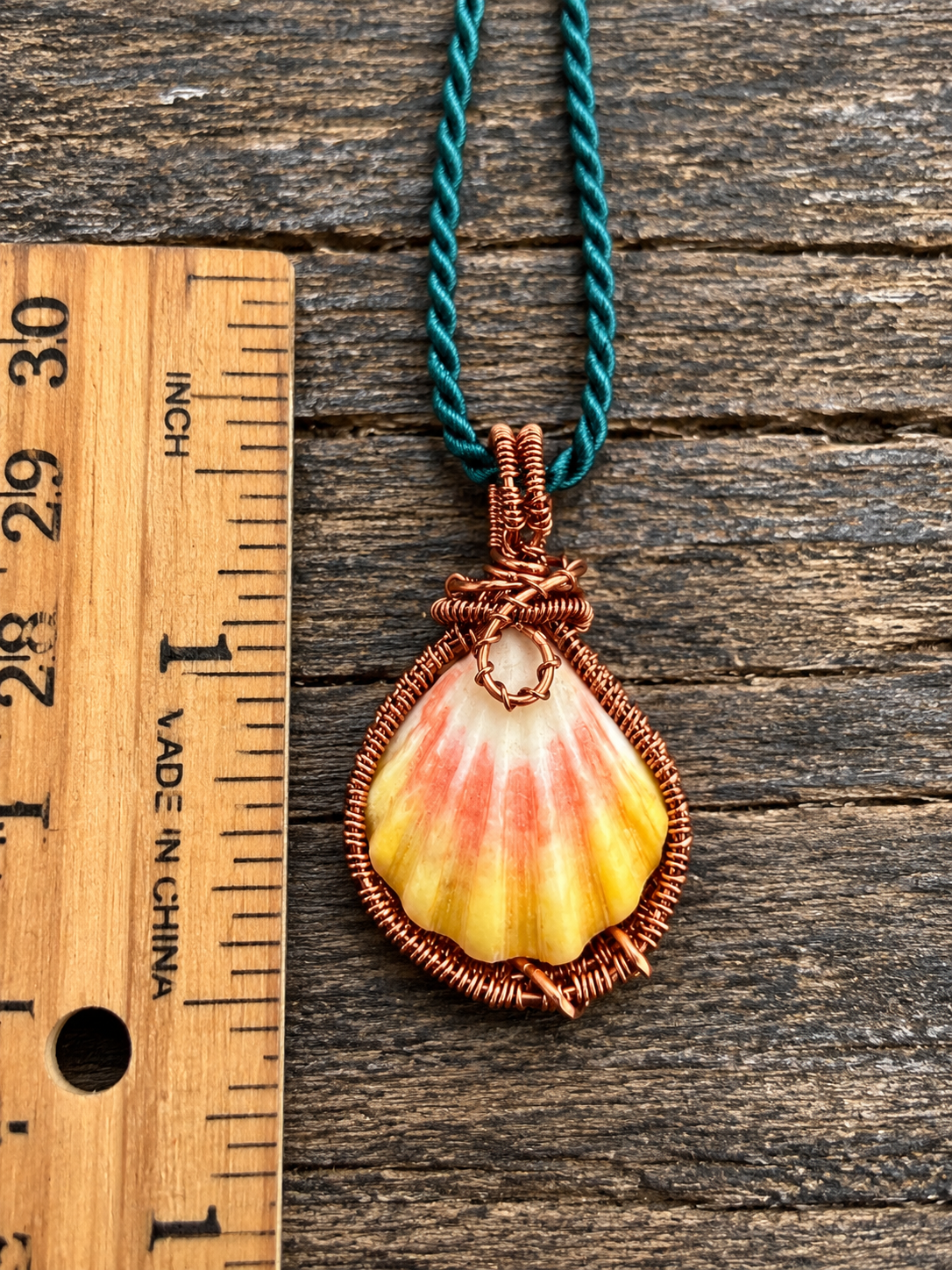 Antique Brass Wrapped Sunrise Shell Pendant