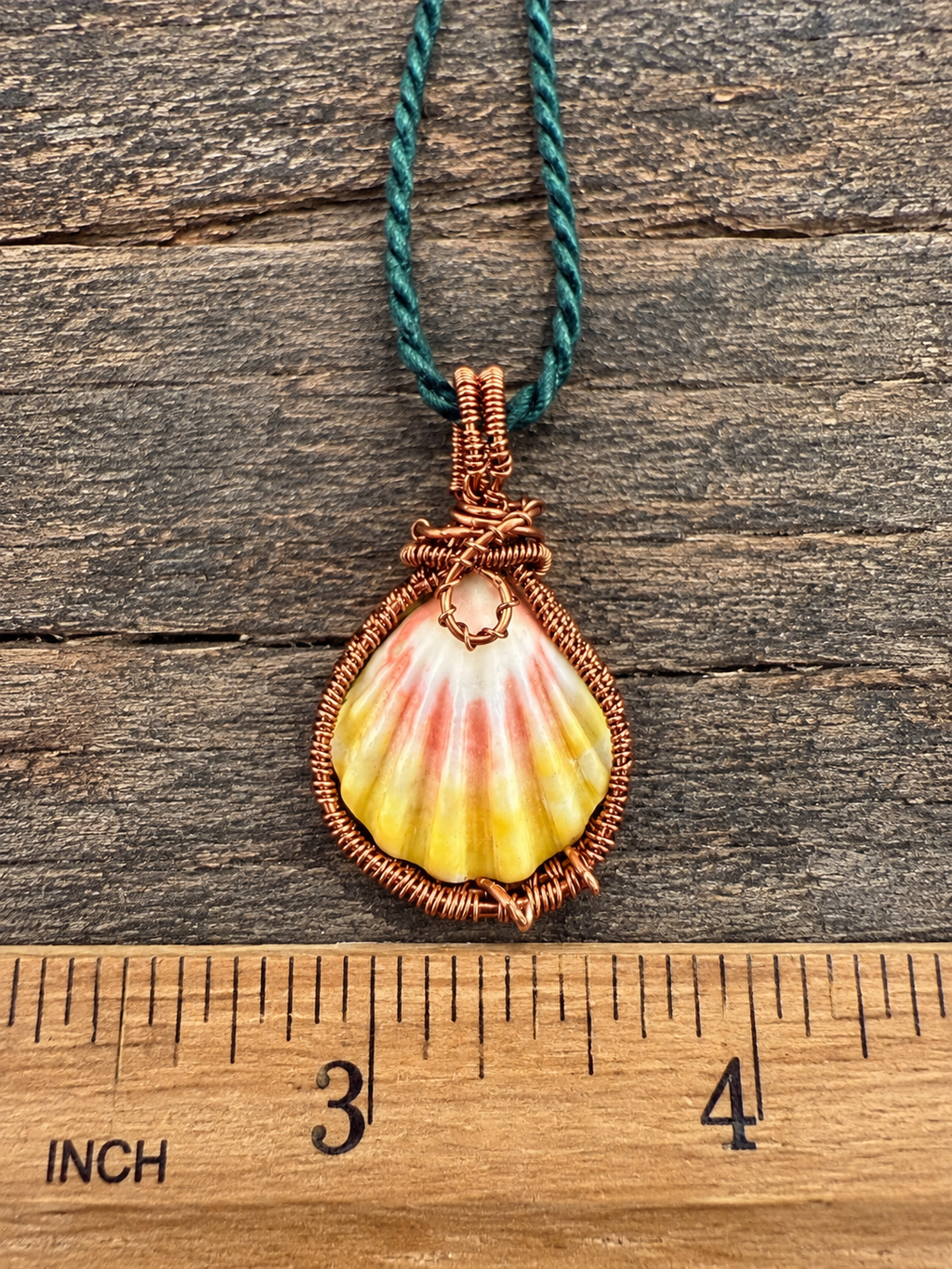 Antique Brass Wrapped Sunrise Shell Pendant