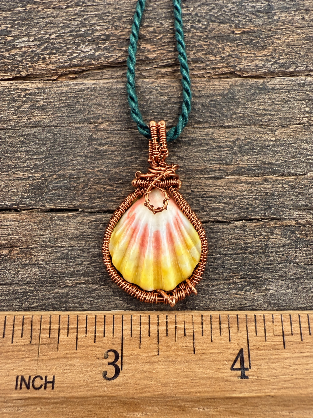 Antique Brass Wrapped Sunrise Shell Pendant